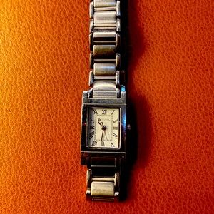 Ladies stainless and silver tanque watch